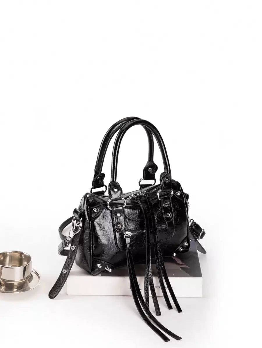 bolsos con tachuelas