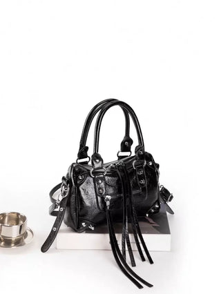 bolsos con tachuelas