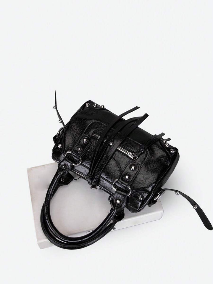 bolsos con tachuelas