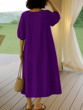 Vestido de dama hasta la mitad de la pantorrilla con mangas abullonadas