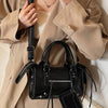 bolsos con tachuelas
