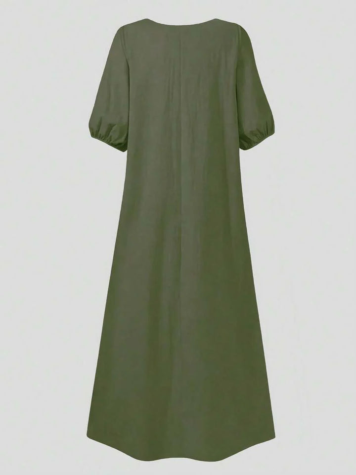 Vestido de dama hasta la mitad de la pantorrilla con mangas abullonadas
