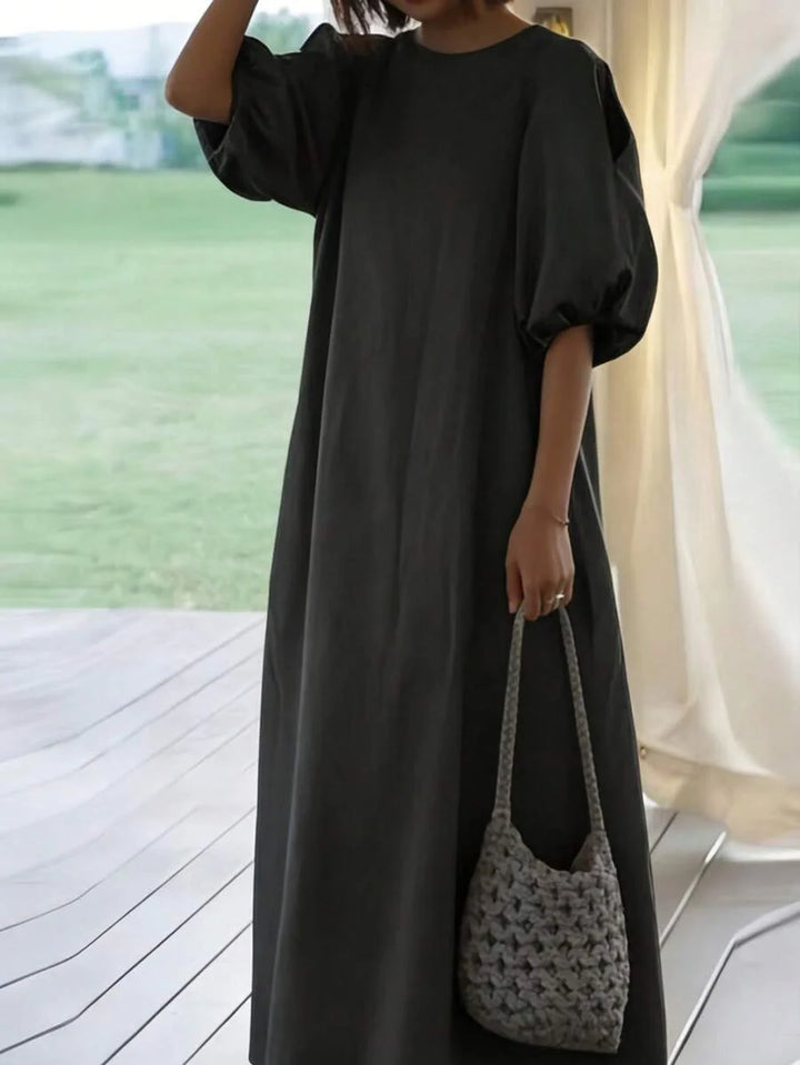 Vestido de dama hasta la mitad de la pantorrilla con mangas abullonadas