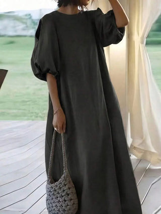 Vestido de dama hasta la mitad de la pantorrilla con mangas abullonadas