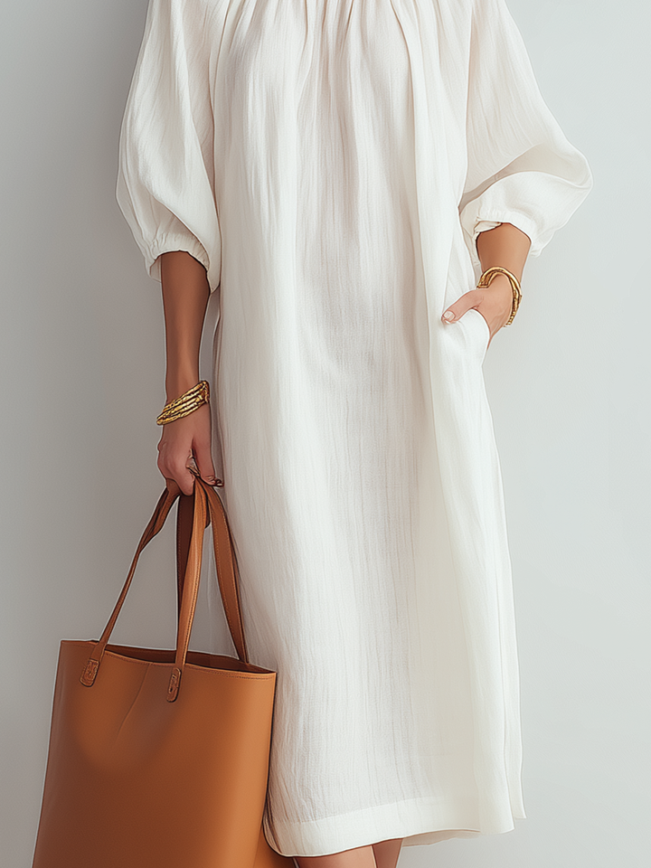 Vestido midi crema de corte relajado