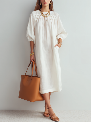 Vestido midi crema de corte relajado